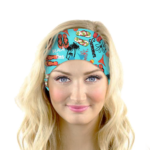 Woman wearing blue summer beach time adult headband