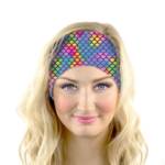 Woman wearing rainbow mermaid adult headband